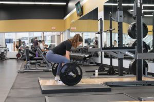 Lifting weights in the gym